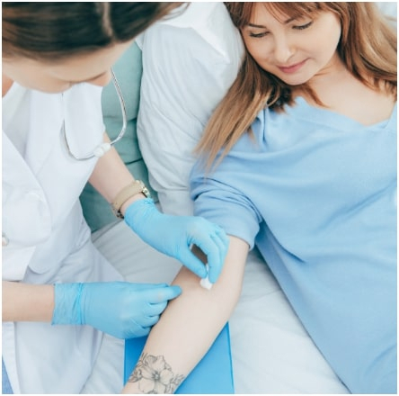 Photo of a woman donating plasma