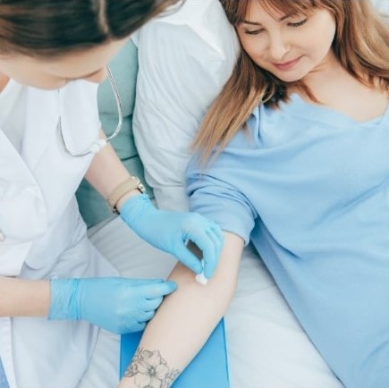 Photo of a person getting their blood pressure checked